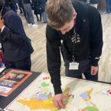 Students and staff at New City College came together to learn about and celebrate the importance of Black History Month with music, dancing, poetry, quizzes and food stalls
